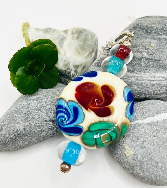 Creme Pendant with Swirled Florals